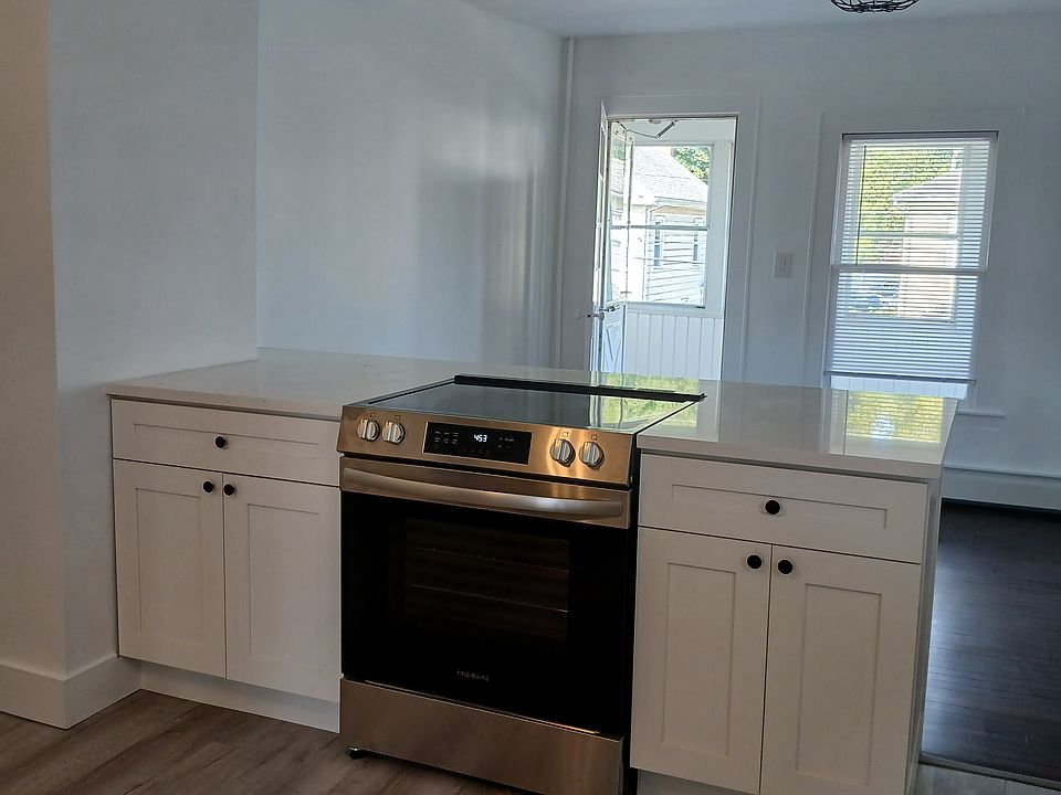 Open concept kitchen-living room with center island