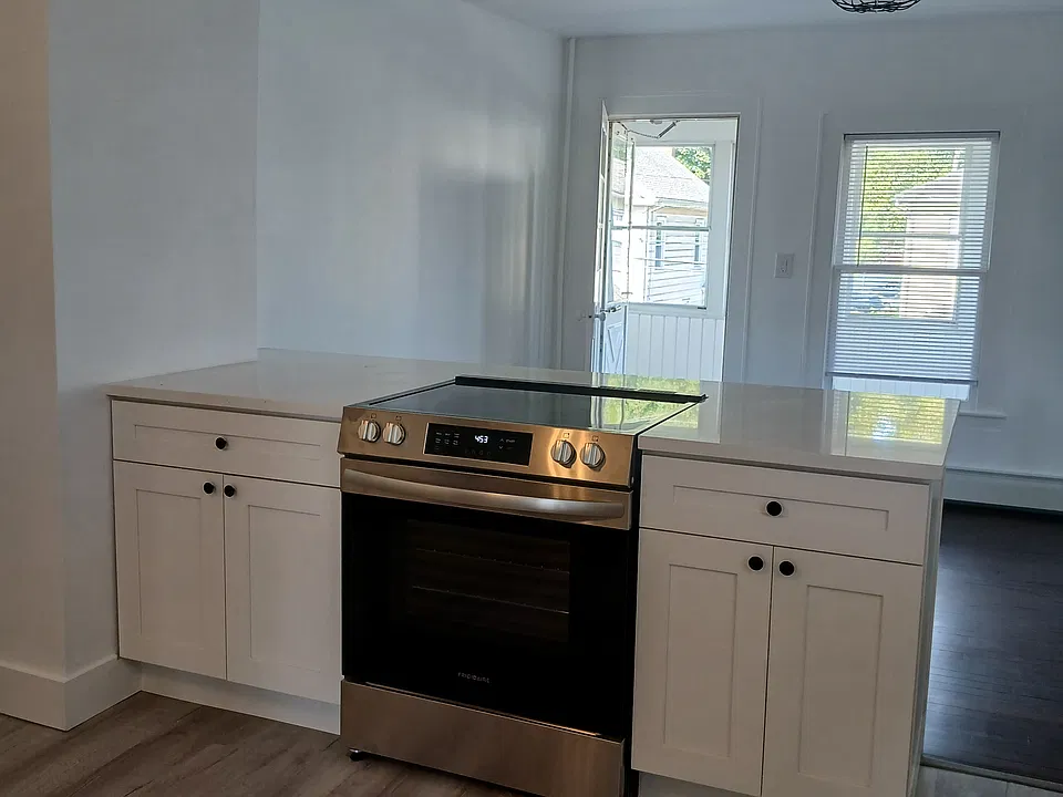 Open concept kitchen-living room with center island