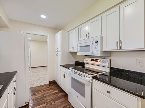 Kitchen with granite counter toops