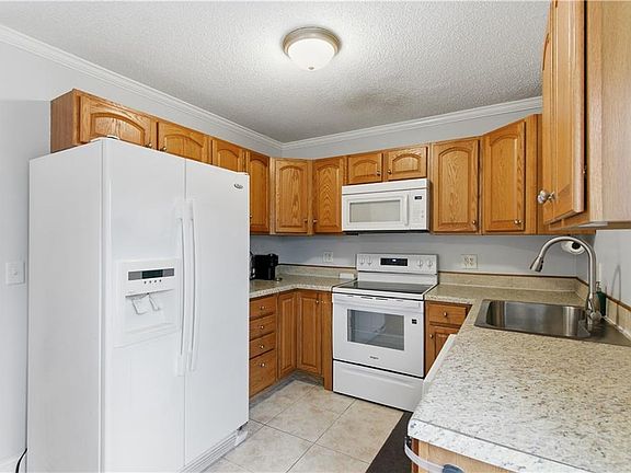 4th image of 8435 Tauromee Ave