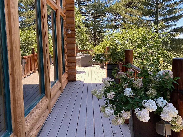 Back deck with beautiful tree views.