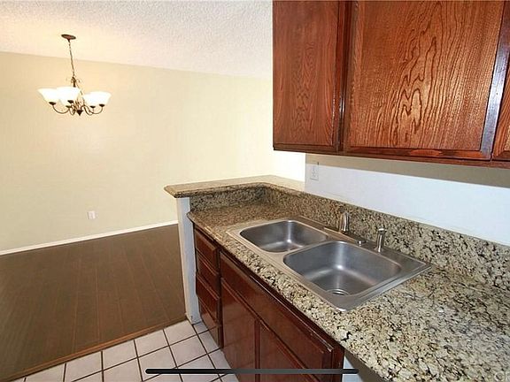 Kitchen with marble counters