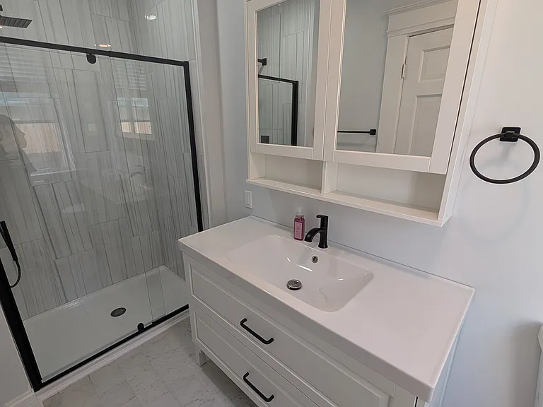 Medicine cabinet and vanity chosen with extra storage in mind!