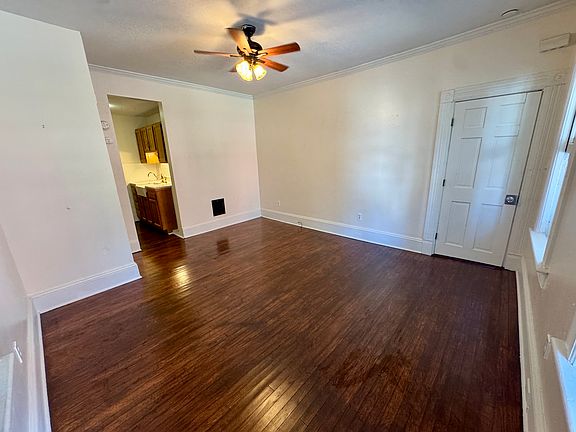 Windows looking out onto a front porch and Main Street, to the Old Dutch Reform Church (now a gallery).