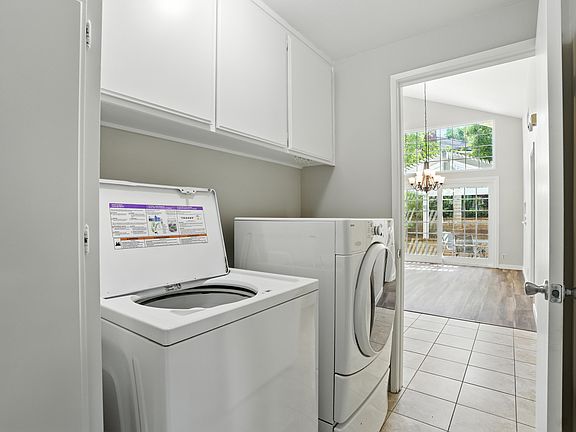 Conventionally located washer / dryer area and machines provided (no warranty)