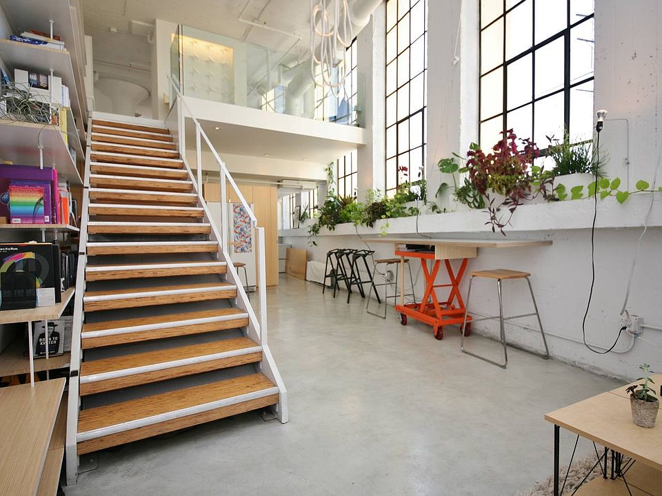 Soaring 17' ceiling loft entry