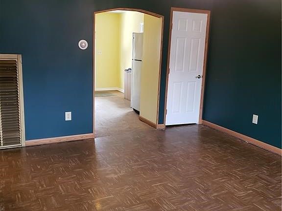 Living room looking into kitchen