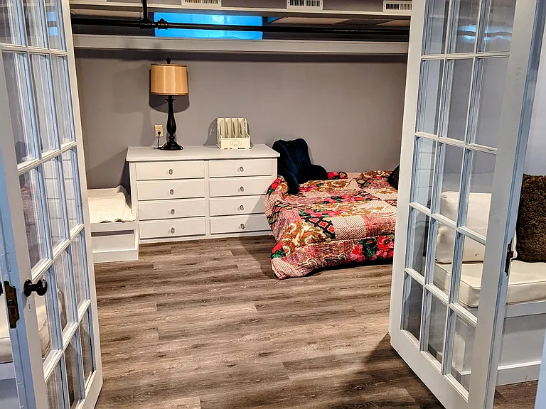 Large Bedroom, Two Beds (one full + one single).