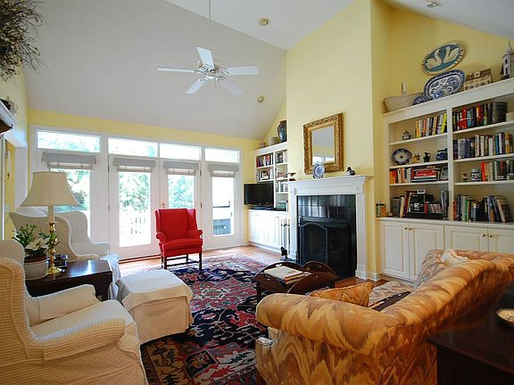 OPEN LIVING ROOM WITH FIREPLACE