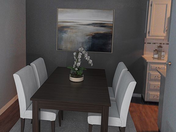 Dining room adjacent to kitchen, modern chandelier (raised, but can be lowered to appropriate height).