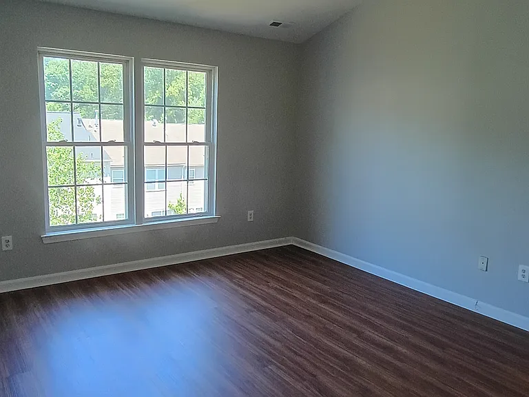 Large master bedroom with vaulted ceilings