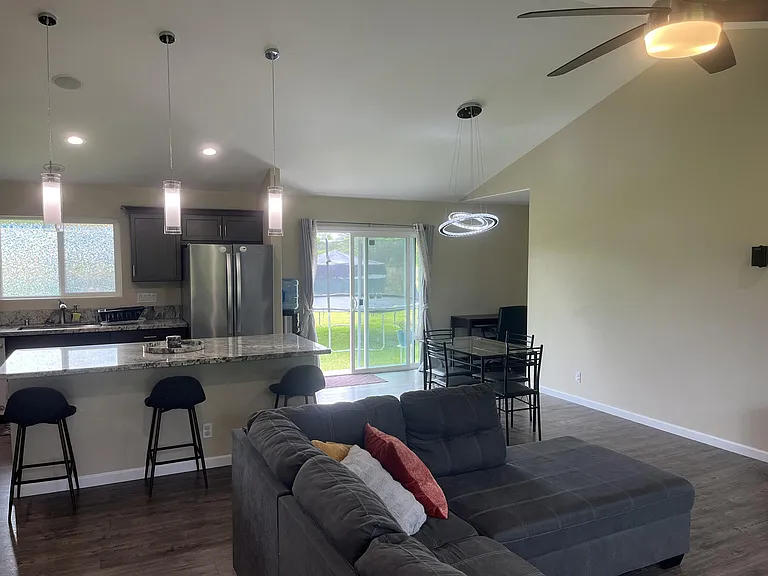 Dining area leads out to back yard and gazebo through sliders