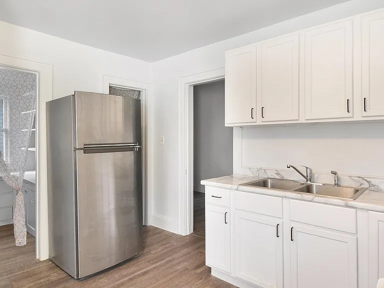 Kitchen featuring two spacious pantries for extra storage.