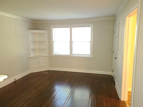 Family Room has Built-In Bookcase