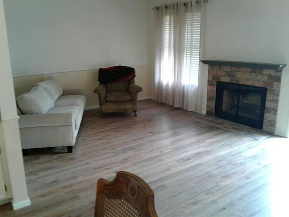 Living room with wood fireplace 