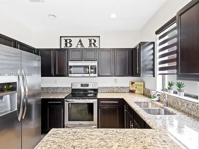 8925 W 33rd Ave — Photo 12