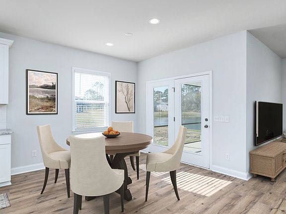 Bright Cafe area that seamlessly flows from the Kitchen and Gathering Room.