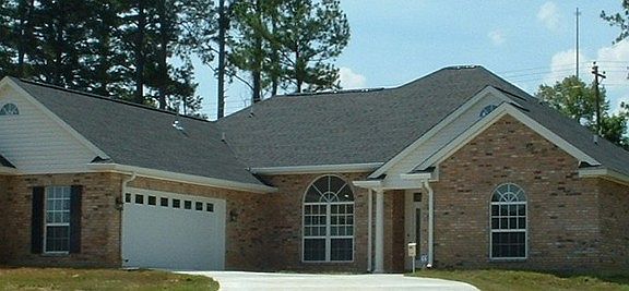 Garage and Drive Way
						:
						Two car garage and the front door