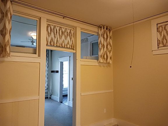 Bedroom looking into front room