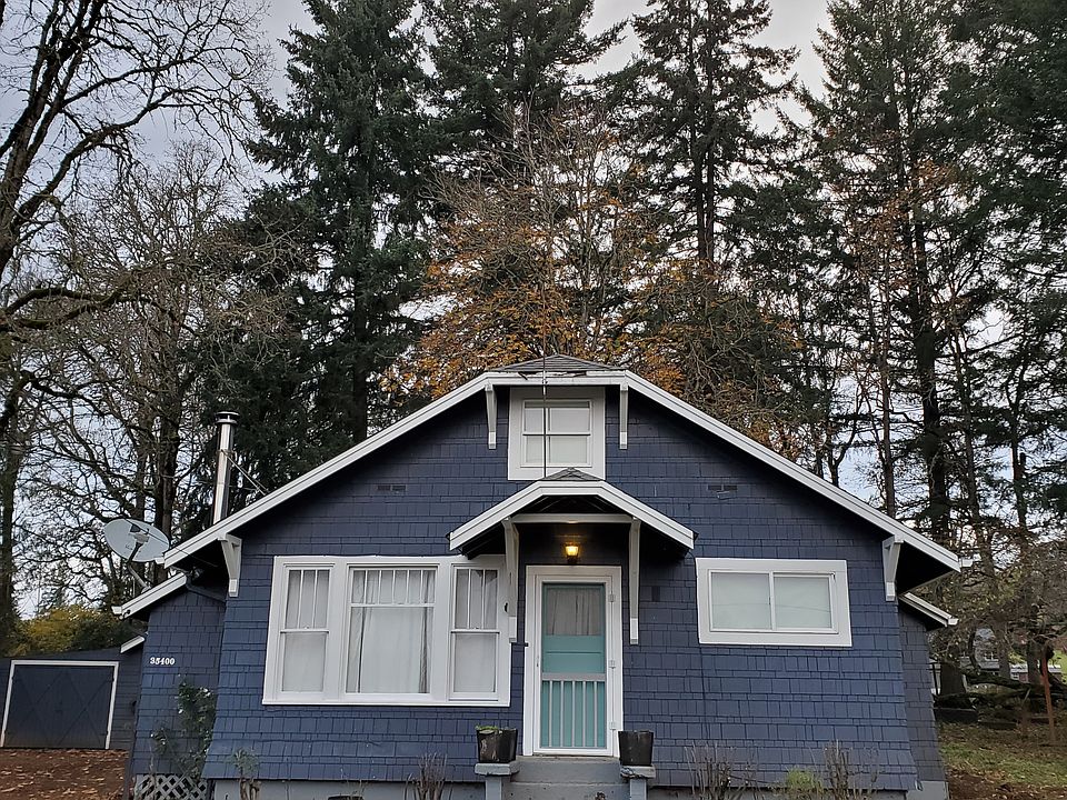 1935 Bungalow on one acre with mature landscaping
