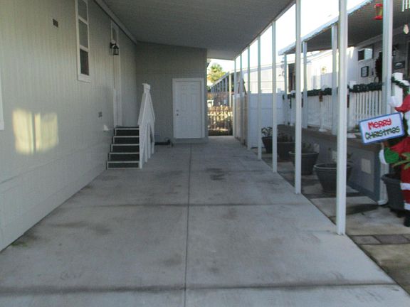 Carport + Storage Shed