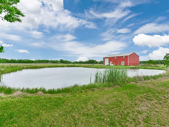 Man made pond in back of Barndominium