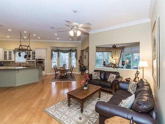 Awe-Inspiring Space!   Open Layout with High Ceilings; Family Gathering space with Kitchen, Breakfast Nook, Family Room and entrance to Sun Room!