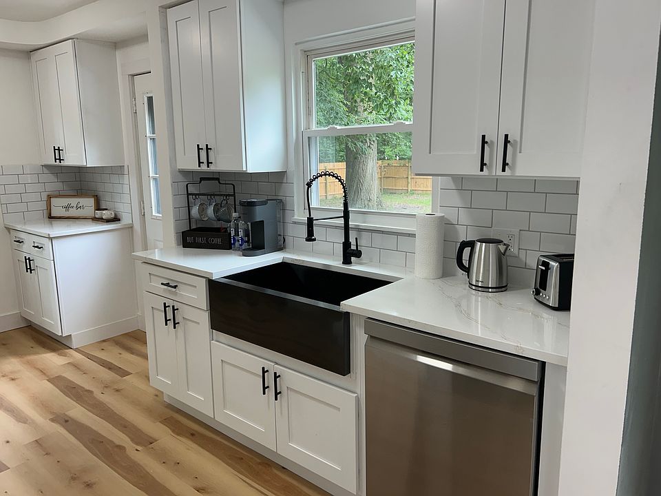 modern new soft close cabinets
new stainless steel appliances 
deep farm-house sink