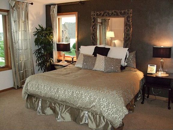 Large Master suite with sitting area & seperate his & hers custom closets!
