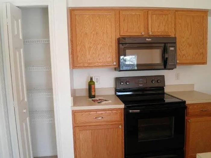 KITCHEN WITH MICROWAVE, DISHWASHER AND PANTRY!