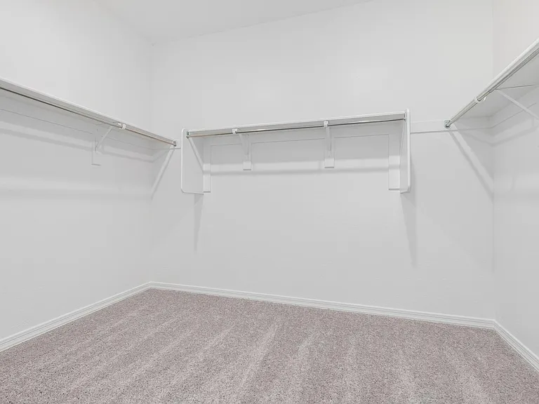 Large walk-in closet in master bedroom