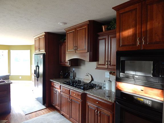 Kitchen w/ cherry cabinets