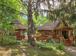 10437 SW Torch Lake Dr, Rapid City, MI 49676
