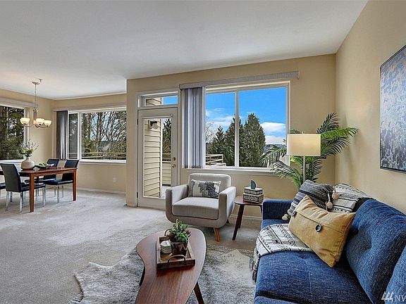 9-ft ceilings, new lighting, Cascade Mountain view.