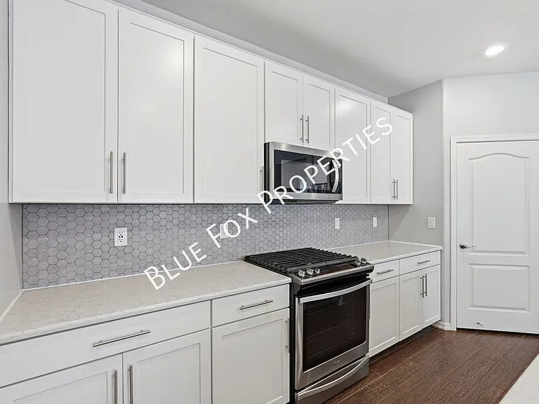 8670 N Genoa Ct — Photo 6