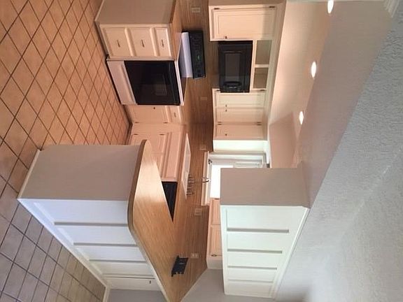 Professionally painted cabinets and trim