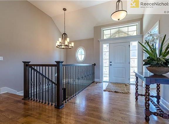 Entry over looks an open floor plan.