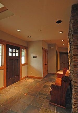 Gorgeous Foyer with slate flooring inlaid with glass tiles.
