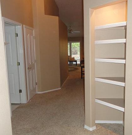 Foyer w/ built-in shelves