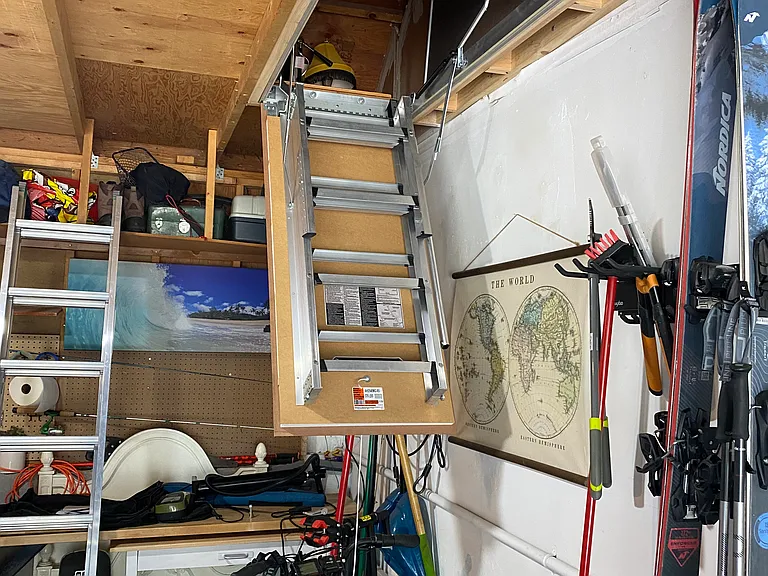 Pull down stairs in garage to access the storage loft upstairs