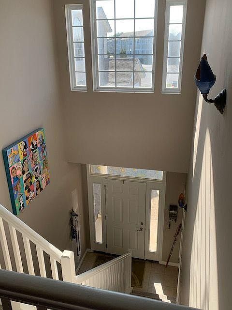 Looking down the stairway to the front door.
