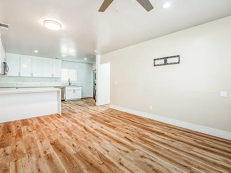 Family Room: TV Mount & Ceiling Fan, LED Lighting, LVP Flooring, Central Heating & Cooling, New Windows.