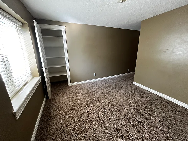 Basement bedroom #2
Built-in shelves in closet