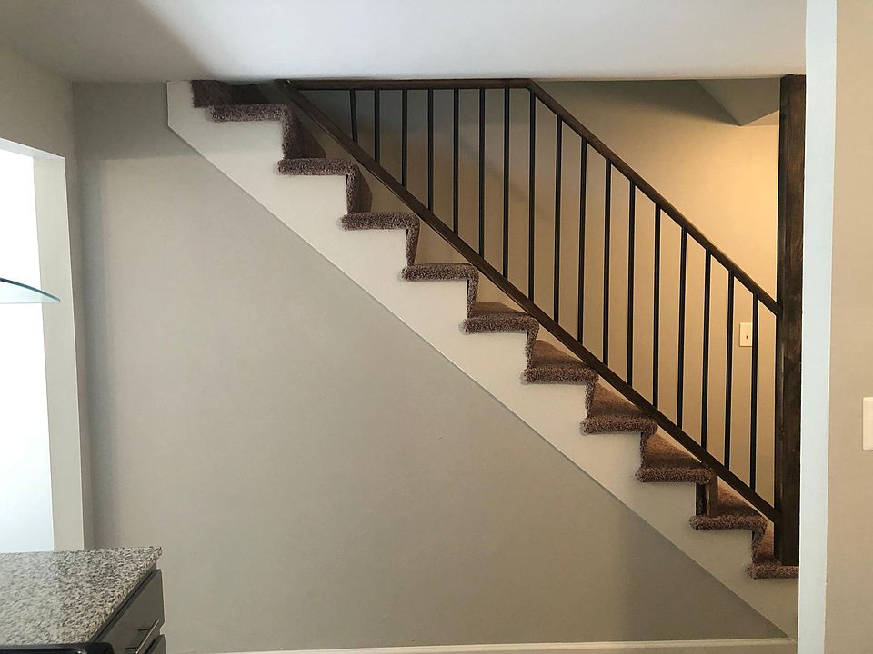 Stairs leading up to the bedrooms.