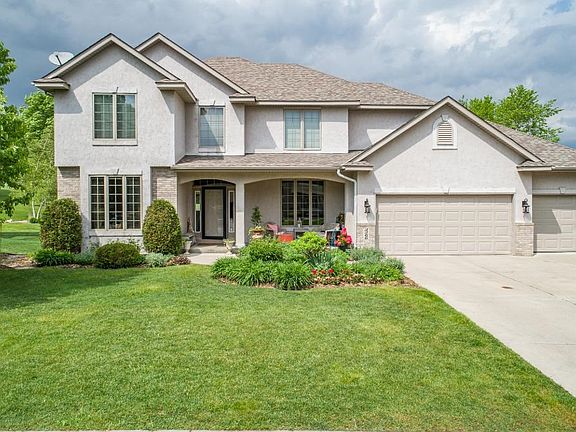 Captivating custom built, one owner home backs up to the 17th fairway of The Wilds! Such an idyllic and relaxing setting!!