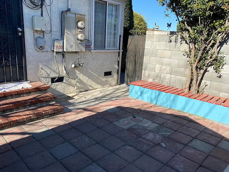 Gated private patio is big enough for an outdoor table