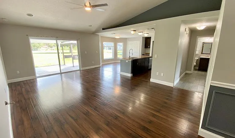Large family/kitchen/dining combo view #3