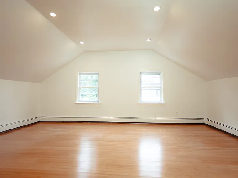 Spacious primary bedroom with plenty of light.