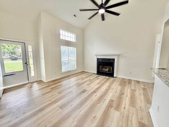 Living room with gas fireplace.