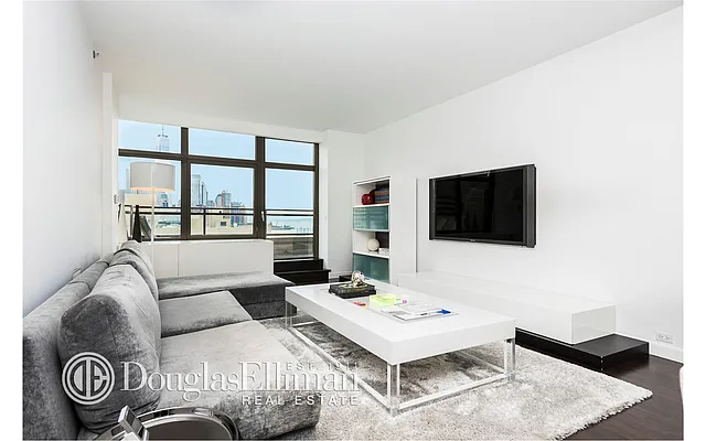 Sold by Douglas Elliman | media 13